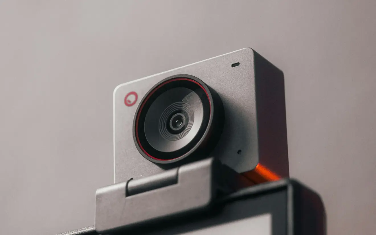 A webcam mounted above a computer monitor.